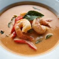 Panang Curry · Panang curry paste, coconut milk, kaffir lime leaf, bell peppers, and basil. Choice of meat.