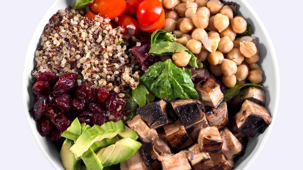 Vegan Mixed Salad · Grilled Portobello Mushroom, Quinoa, Spring Mix, Spinach, Cherry Tomatoes, Chickpeas, Cranberries, Avocado, and house-made Balsamic Vinaigrette Dressing.