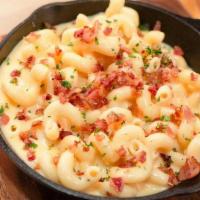Custom Mac & Cheese · Dive into this cheesy, gooey, delicious blend of cheese and cavatappi pasta. Top it with you...