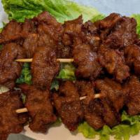 Thịt Nướng Xiên Chay (3 Skewers) · Vegetarian (imitation) pork skewer.