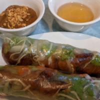 Nem Chay Cuốn (2 Rolls) · Fresh vegan (imitation) pork sausage patty spring roll with peanut sauce.