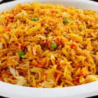 Vegetable Biryani · Basmati rice cooked with saffron, fresh vegetables, and nuts.