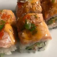 V Roll · California roll topped with seared salmon, tobiko and spicy mayo