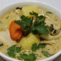 Yellow Curry With Rice/24 Oz · Potato, carrot, and onion in coconut milk.SERVED WITH RICE