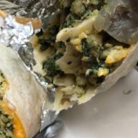 Skinny Burrito · Scrambled egg, potatoes, spinach, and cheese (swiss and cheddar) in flour tortilla.