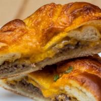 Beef And Cheese Piroshky · Our most popular Piroshky filled with our signature seasoned beef and cheddar cheese