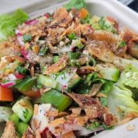 Fattoush · Romaine, tomato green pepper, radish, English cucumber, green onion and parsley, with a lemo...