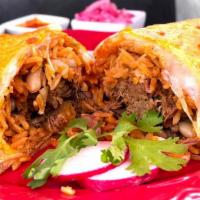 Burrito · Flour tortilla, birria, cheese, rice, beans, onions and cilantro.