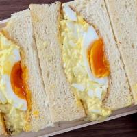 Egg Sando (Egg Sandwich) · diced jidori eggs, mayonnaise, secret sauce & shokupa bread.