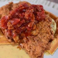 Chicken & Waffle Supreme · hot and sticky fried jumbo bone-in thigh and leg, honey butter, buttermilk waffles