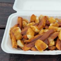 Poutine · Our awesome hand-cut fries served with savory beef gravy (will be on the side) and Wisconsin...