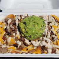 Carne Asada Fries  · Hand cut fries smothered in cheddar jack cheese and topped with asada marinated steak, asada...