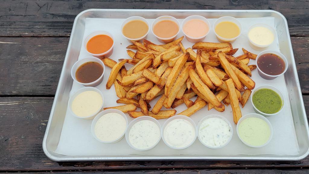 Regular Fries · Hand-cut delicious French fries! Comes with your choice of 2 house-made dipping sauces. Yum!
