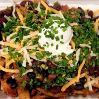 3 Bean Chili Cheese Fries · House cut fries  topped with our house-made 3 bean chili, sour cream, cheese blend, and scal...