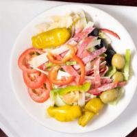 Antipasto Salad · Artichoke hearts, fresh roma tomatoes, pepperoncinis, black and green olives, provolone chee...