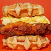 Chicken & Waffle Breakfast Sandwich · Crispy fried chicken, eggs, and maple syrup between 2 belgian waffles