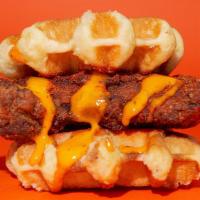 Nashville Hot Chicken & Waffle Sandwich · Crispy nashville hot chicken, farm sauce between 2 belgian waffles