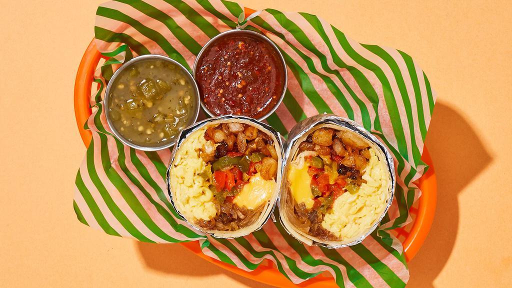 Fluffy Fajita Breakfast Burrito · Two scrambled eggs with crispy potatoes, melted cheese, sauteed peppers and onions, and salsa.