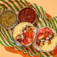 Cozy Veggie Breakfast Burrito · Two scrambled eggs with crispy hash browns, sauteed peppers and onions, mushrooms, and tomat...