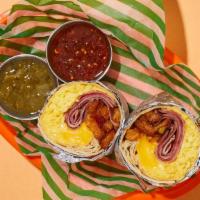 Hungry Ham Breakfast Burrito · Two scrambled eggs with savory ham, crispy hash browns, and melted cheese wrapped up in a fl...