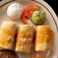 Flautas · 3 crispy flour tortillas, filled with shredded beef, shredded chicken or ground beef topped ...
