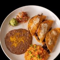Tacos La Costa · 3 tacos with your choice of meat; steak,grilled chicken, fish, or shrimp, topped with parmes...