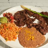 Carne Asada · The authentic thin, tender steak grilled to perfection served with green onion, pico de gall...
