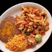 Steak Or Chicken Carnitas · Stir-fried meat strips green pepper, onion, tomato and garnished with guacamole and pico de ...