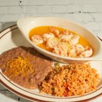 Camarones A La Mexicana · Shrimp and crab meat sauteed with butter and parmesan cheese.