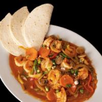 Arroz Con Camarones · Shrimp cooked in la costa sauce with mushrooms, onions, bell peppers and celery; served over...
