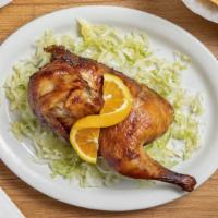 Half Chicken · Served with rice, beans, and tortillas.