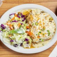 Enchiladas Suizas · Wo cheese enchiladas with tomatillo sauce, topped with onions, green chile strips, and sour ...
