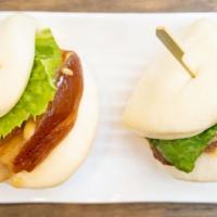 Steamed Buns · Steamed bun with pork, chashu & cabbage.