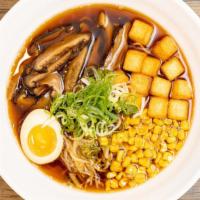 *Veggie Ramen · Miso flavored broth with corn, bean sprouts, green onion, shitake mushroom and fried tofu.