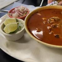 Pozole · A delicious pork meat stew that includes hominy and our signature red sauce served with your...