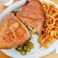 Torta · Mexican-style sandwich served with a side of fries and your choice of meat.