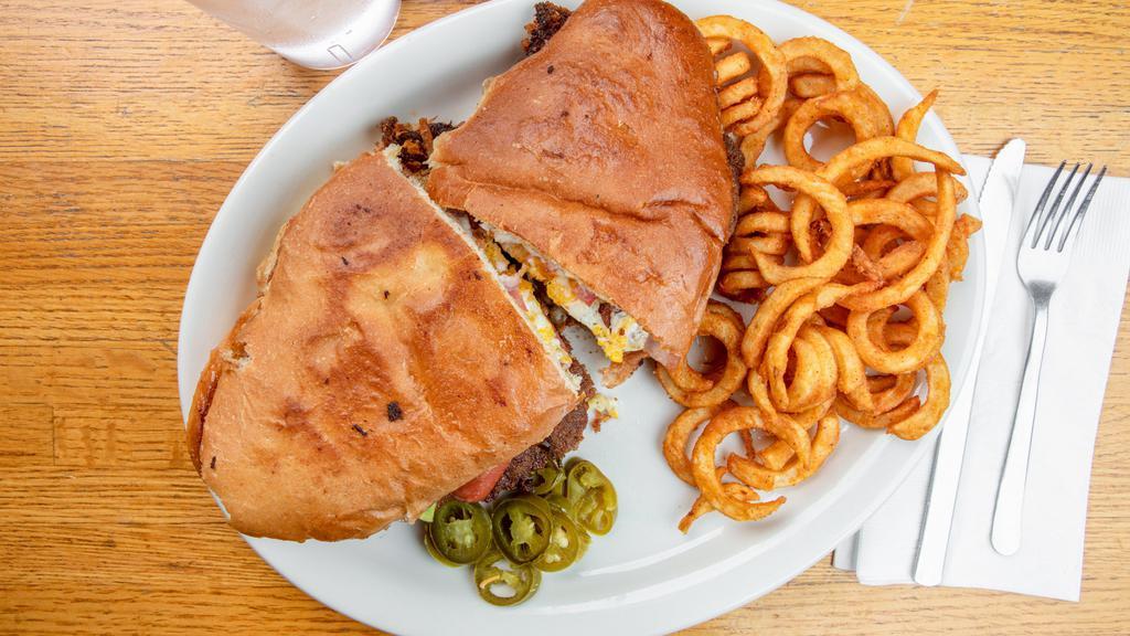 Torta · Mexican-style sandwich served with a side of fries and your choice of meat.