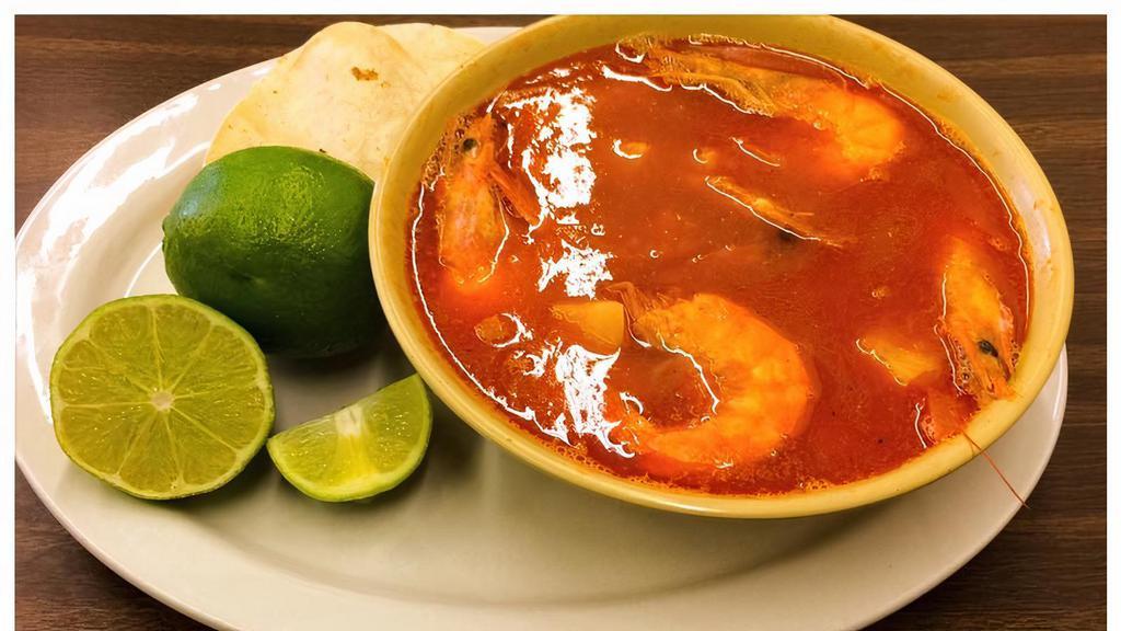 Caldo De Camaron · Mexico-style shrimp stew served with a side of lime and your choice of corn or flour tortilla.