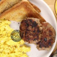 The Classic · Three scrambled eggs served with choice of bacon or sausage. Served with toast and Betty's B...