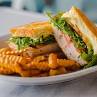 Betty'S At The Club Sandwich · Roasted turkey, bacon, swiss cheese, avocado, jalapeno jam, mayo, arugula and tomatoes on a ...