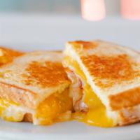 Kids Grilled Cheese Sandwich · Swiss Cheese, Cheddar Cheese on Toasted French Baguette.