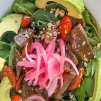 Betty'S Steak Lover'S Salad · Gluten free. Peppercorn crusted steak with roasted tomatoes, red onions, Feta cheese, avocad...
