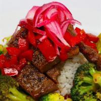Peppercorn Crusted Steak Bowl · Gluten free. Peppercorn crusted steak, broccoli, Red peppers, pickled red onions and balsami...