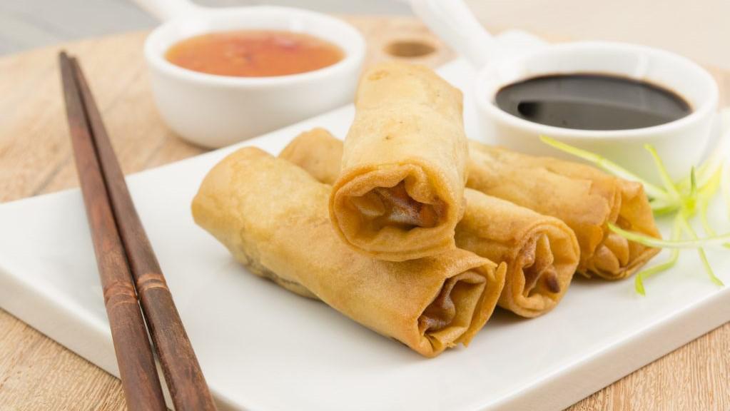 Crispy Spring Rolls (3 Pcs) · Vegetable. Deeply fried rice paper wrap filled with glass noodles, cabbage, and carrot. Served with sweet and sour sauce.