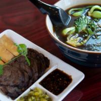 Taiwanese Beef Noodle Soup · Served with beef broth, bok choy, and scallions, and braised beef and tofu on the side with ...
