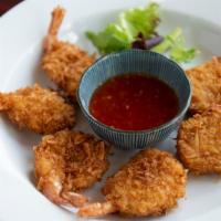 Coconut Shrimp · Deep fried coconut breaded shrimp and served with sweet chili sauce.
