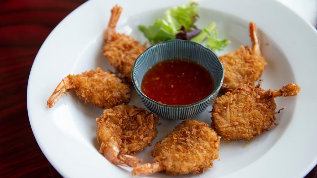 Coconut Shrimp · Deep fried coconut breaded shrimp and served with sweet chili sauce.