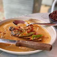 Panang Neau Yang · Grilled flat iron steak in Panang curry sauce and Kaffir lime zest. (Unable to make this ite...