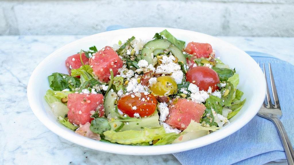 Heirloom Tomato & Watermelon Salad · quinoa, shaved cauliflower, cucumber, pistachio, french feta, champagne vinaigrette.