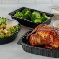 Family On The Fly · Whole Bird, Caesar Salad, Choice of Large Side. (Serves 4).